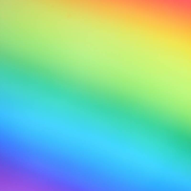 An image of a rainbow colored background.